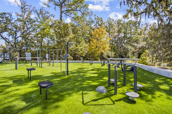 Outdoor fitness center with modern equipment at 1000 West Apartments