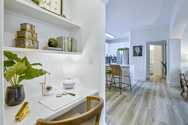 Cozy home office with modern furnishings at 1000 West Apartments