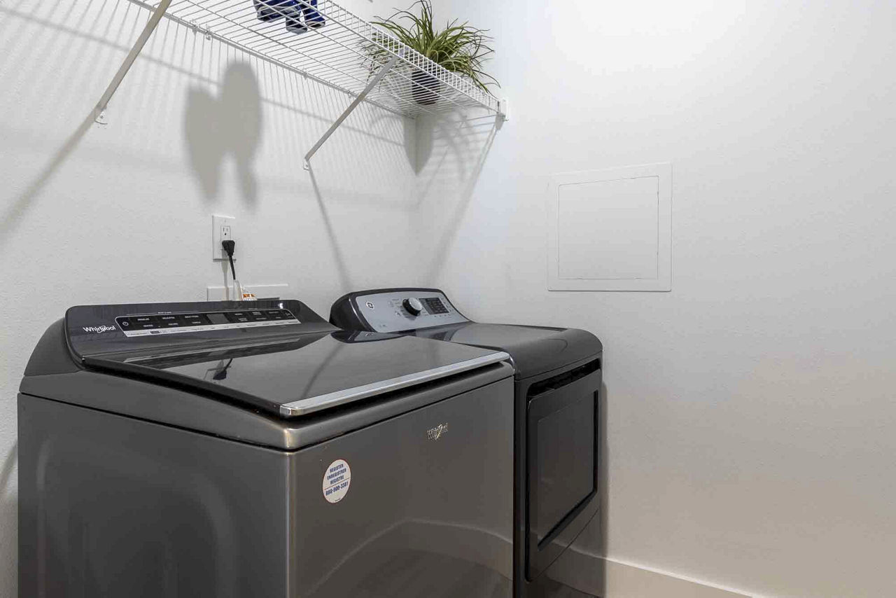 Laundry room at 1000 West Apartments
