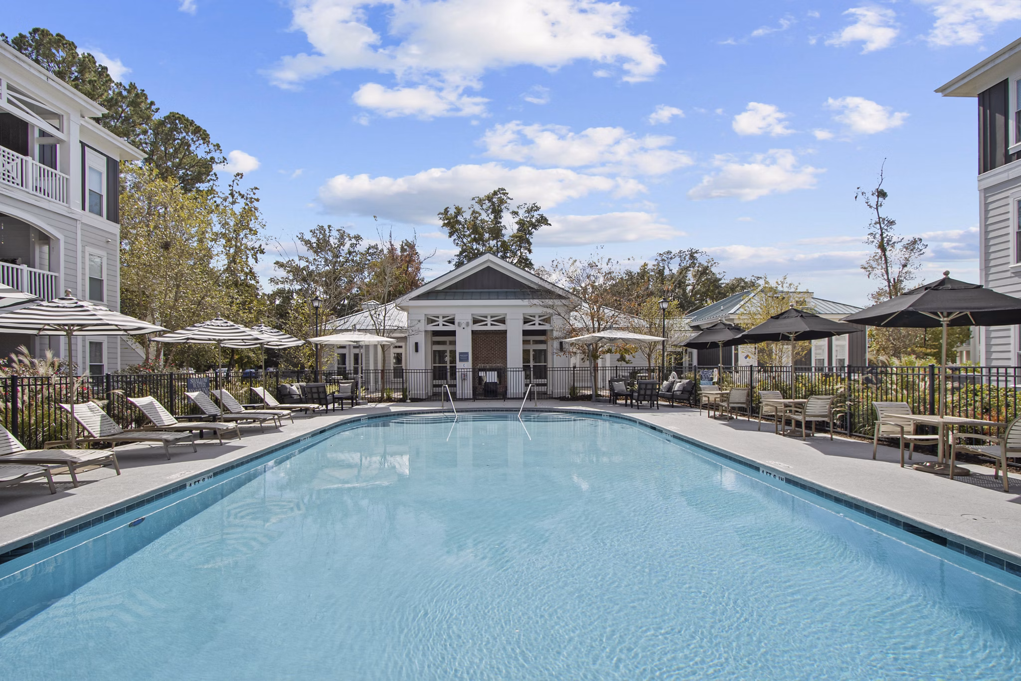Luxury rooftop pool with city views at 1000 West Apartments