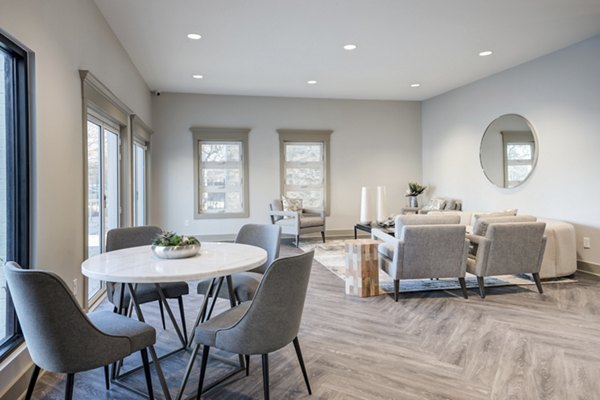 Dining area with modern furnishings in Mallard Crossing at St Matthews Apartments