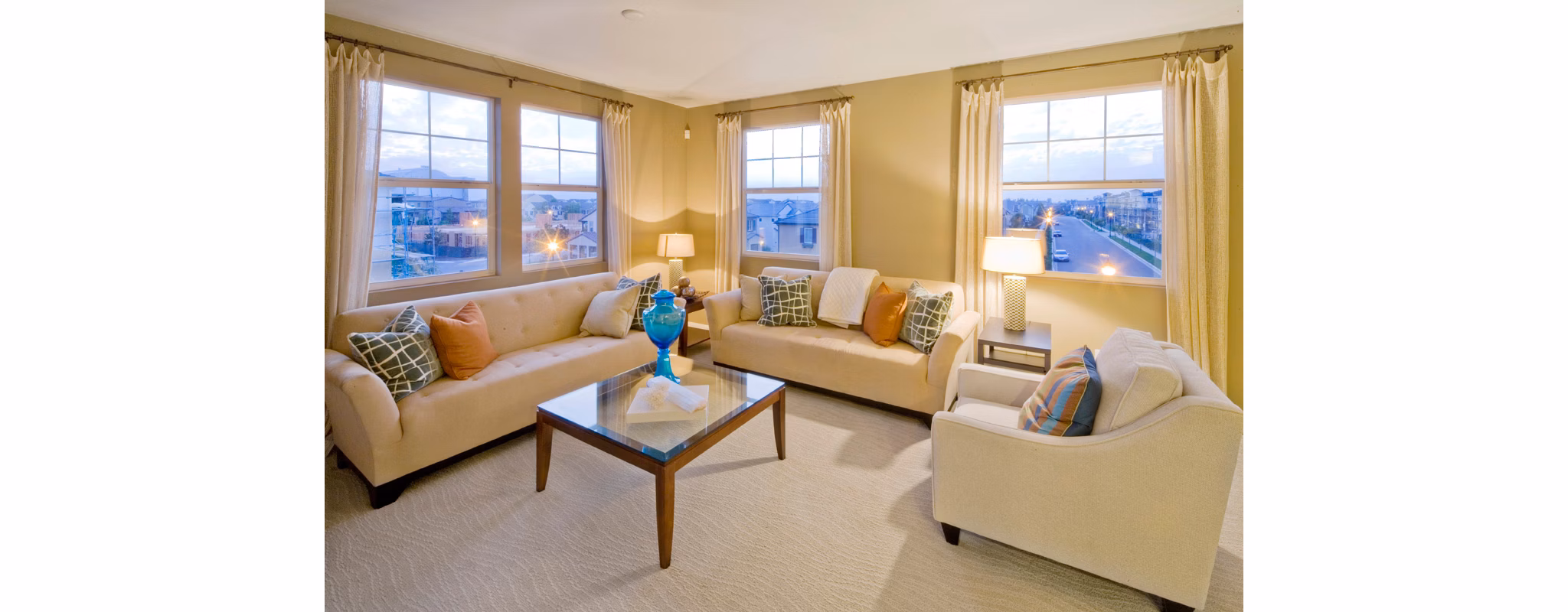Spacious living room with modern furnishings at Coventry Court Luxury Senior Apartments, ideal for comfortable senior living