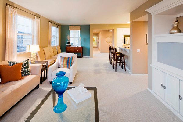 Coventry Court Luxury Senior Apartments: Cozy living room with contemporary decor and ample natural light