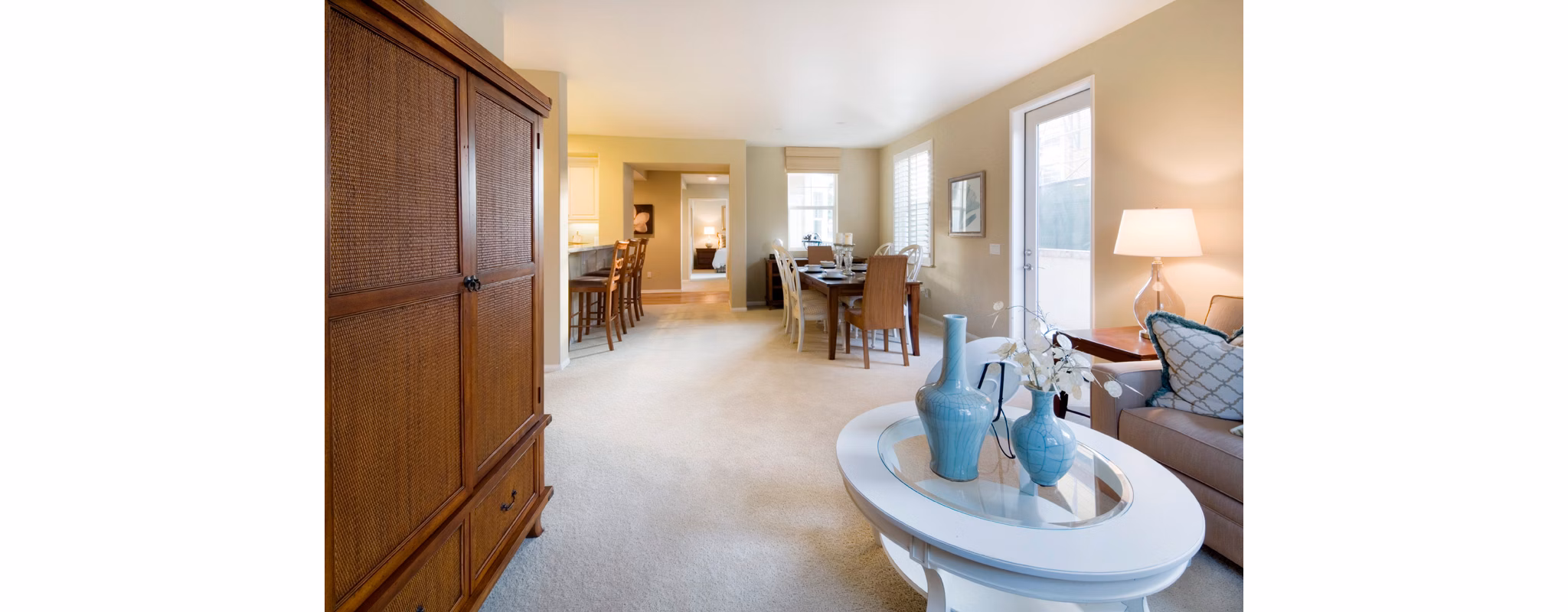 Spacious living room with elegant furnishings at Coventry Court Luxury Senior Apartments
