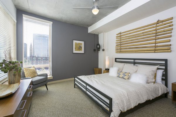 Modern bedroom with elegant decor at Solera Apartments