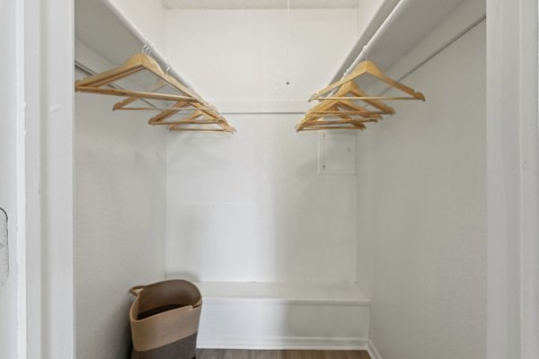Cozy walk-in closet with ample shelving and space in Coventry Park Apartments