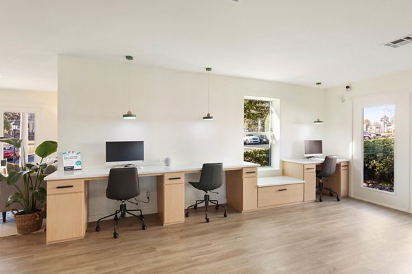 Modern clubhouse with stylish lounge at Coventry Park Apartments, offering luxury living spaces near  training center