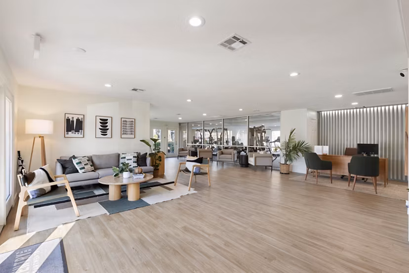 Modern clubhouse with stylish lounge seating and entertainment space at Coventry Park Apartments