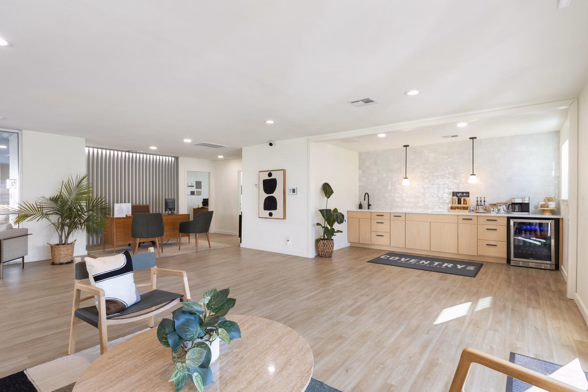 Clubhouse with modern furnishings and open space at Coventry Park Apartments