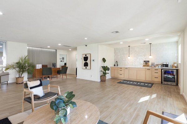 Clubhouse with modern furnishings and open space at Coventry Park Apartments