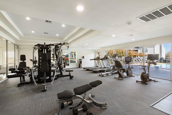 State-of-the-art fitness center at Coventry Park Apartments featuring modern exercise equipment and spacious workout areas