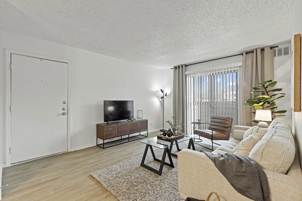Elegant living room with modern furnishings at Coventry Park Apartments