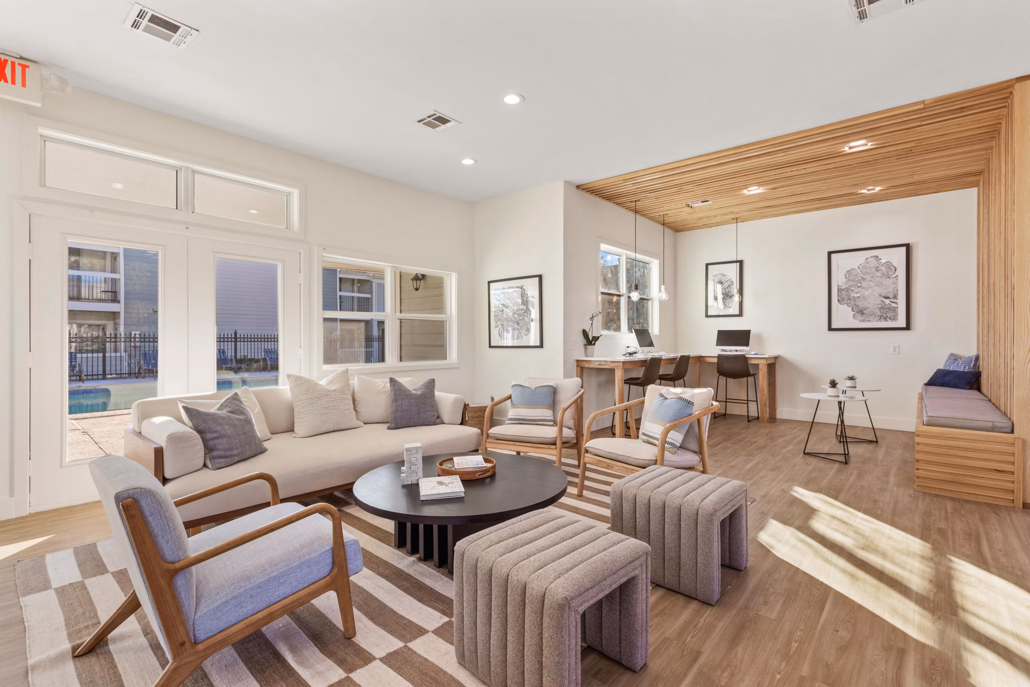 Clubhouse featuring modern design and comfortable seating at Cascades at Southern Hills Apartments
