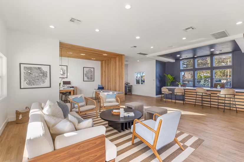 Clubhouse featuring modern design at Cascades at Southern Hills Apartments