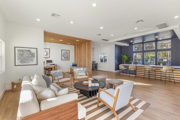 Clubhouse featuring modern design at Cascades at Southern Hills Apartments