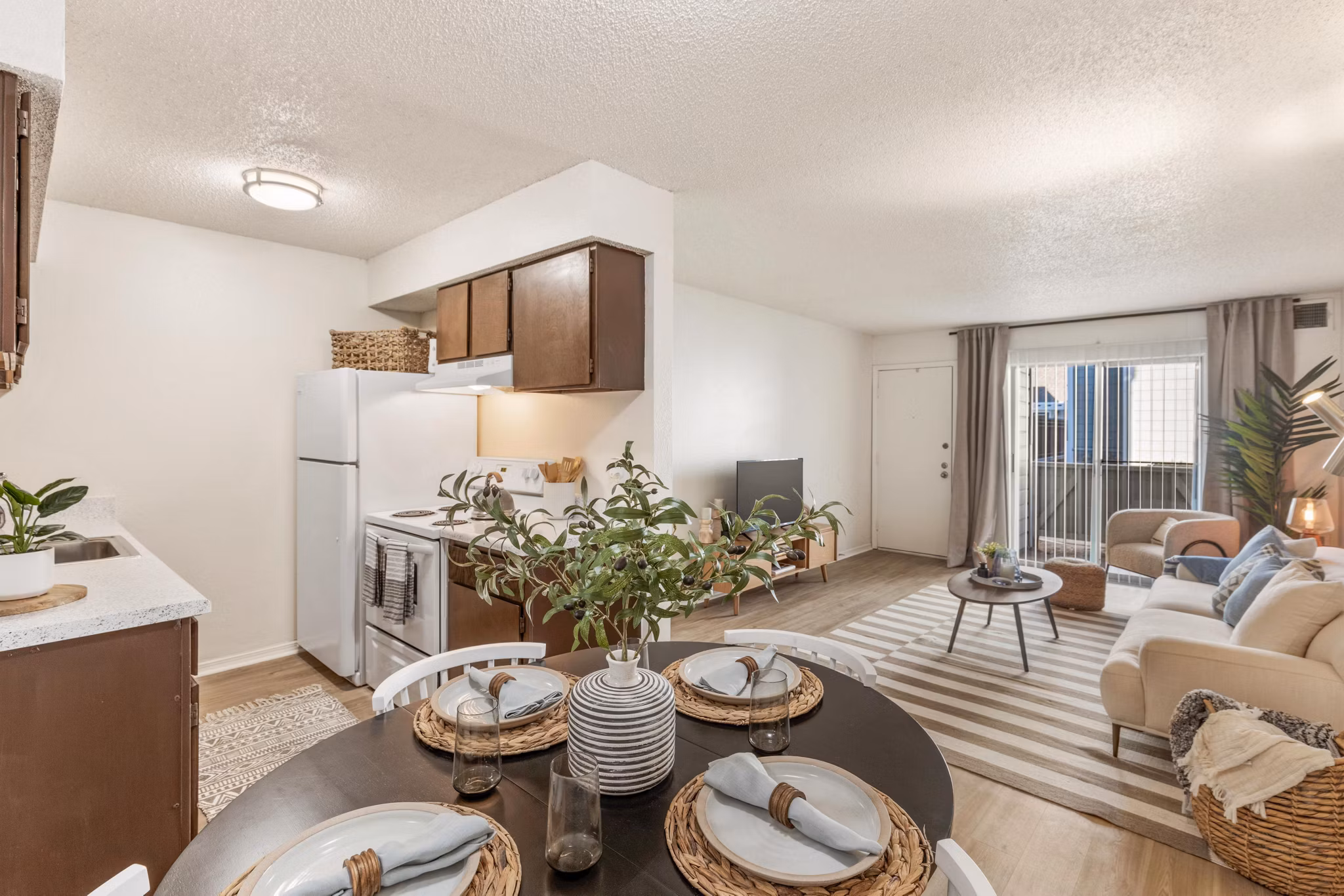 Dining area featuring modern furnishings at Cascades at Southern Hills Apartments in a luxury Greystar property