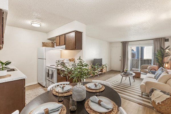 Dining area featuring modern furnishings at Cascades at Southern Hills Apartments in a luxury Greystar property