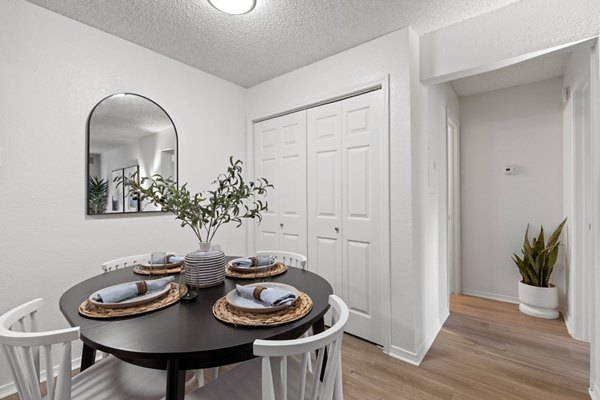 Elegant dining area with modern decor at Cascades at Southern Hills Apartments