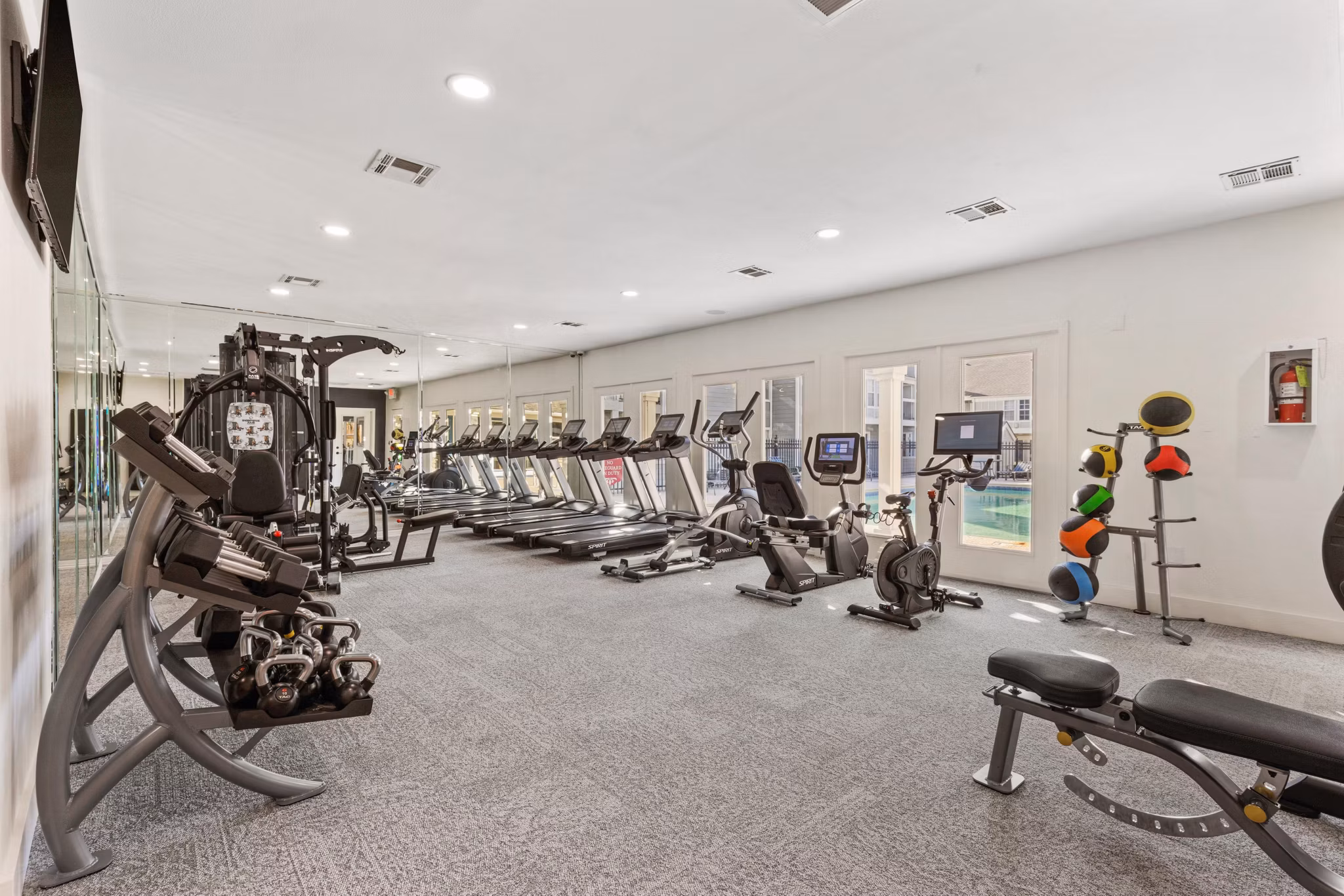 Modern fitness center with state-of-the-art equipment at Cascades at Southern Hills Apartments