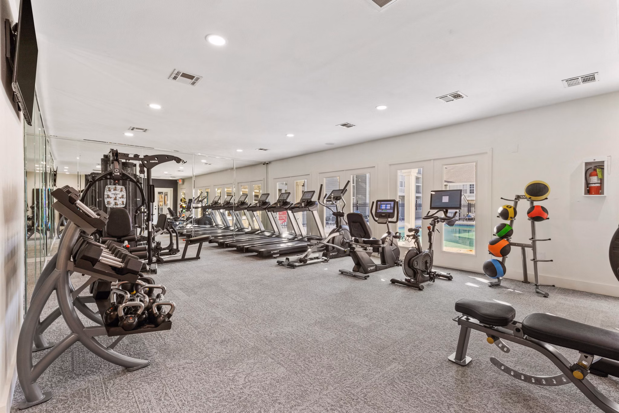 Modern fitness center with state-of-the-art equipment at Cascades at Southern Hills Apartments
