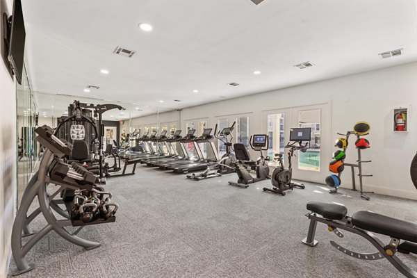 Modern fitness center with state-of-the-art equipment at Cascades at Southern Hills Apartments