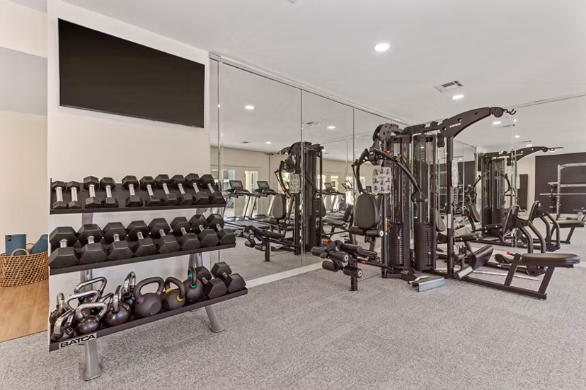 State-of-the-art fitness center with modern equipment at Cascades at Southern Hills Apartments