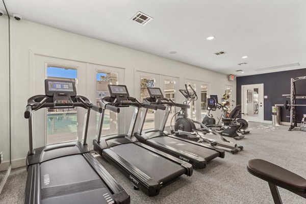 State-of-the-art fitness center with modern equipment at Cascades at Southern Hills Apartments