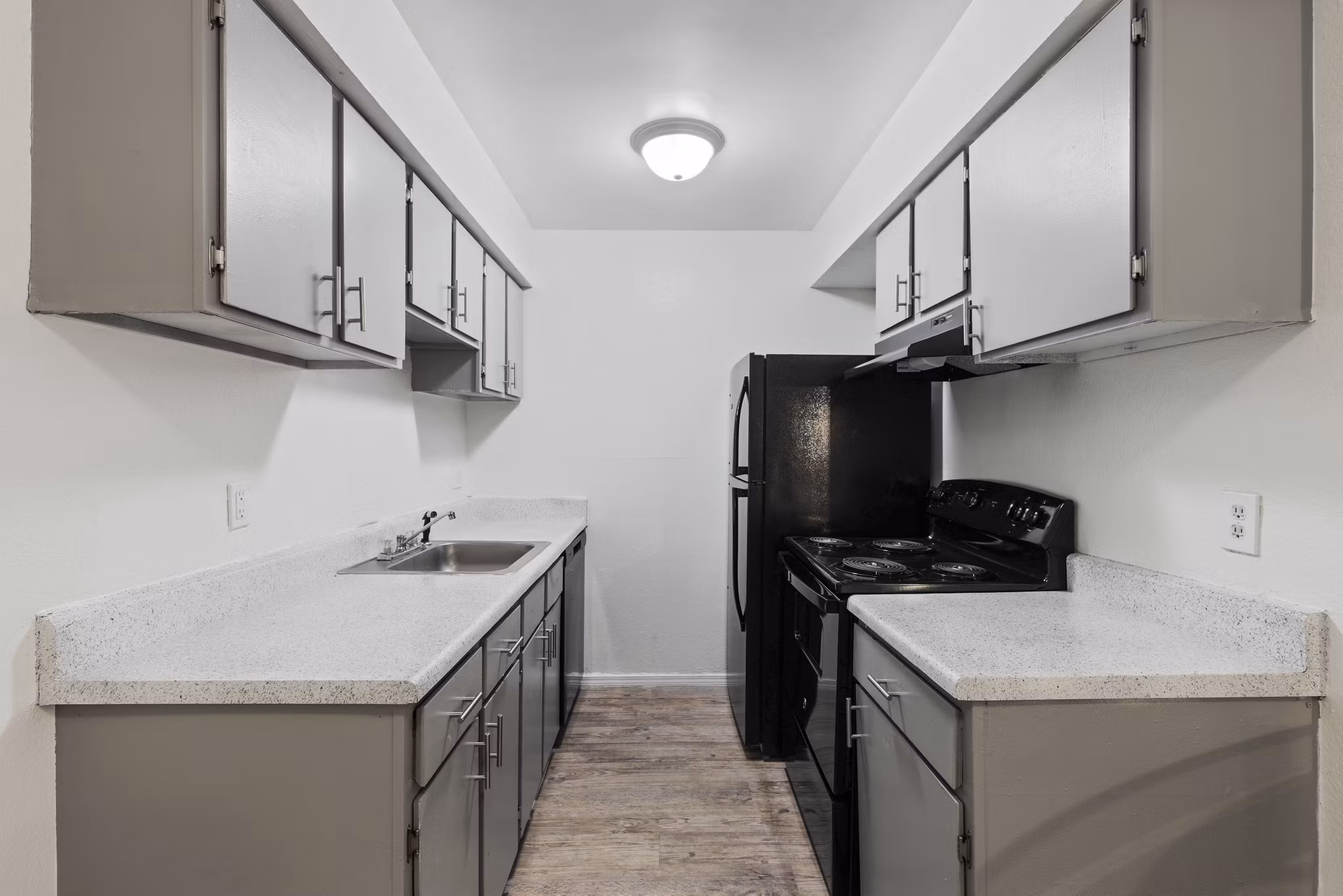 Spacious kitchen with modern appliances at Cascades at Southern Hills Apartments
