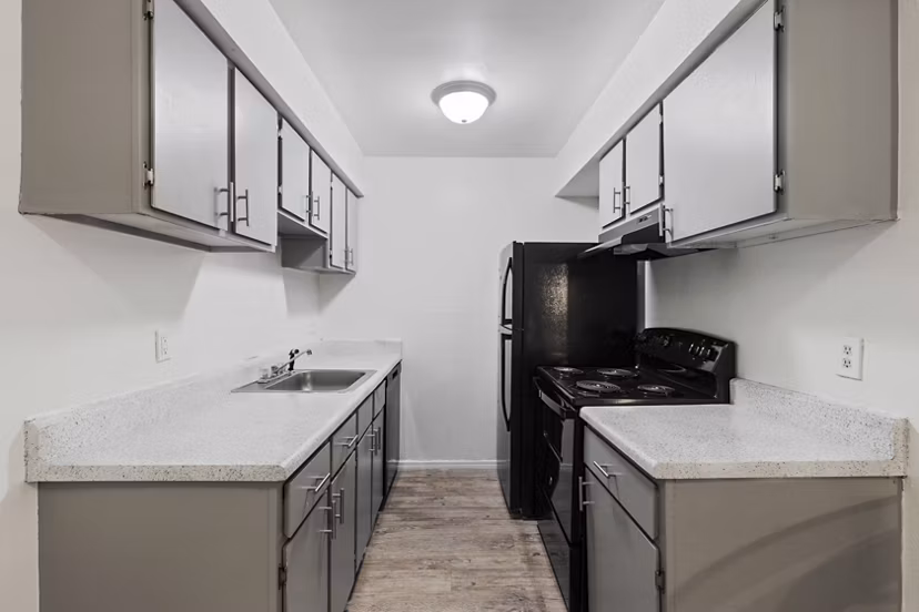 Spacious kitchen with modern appliances at Cascades at Southern Hills Apartments