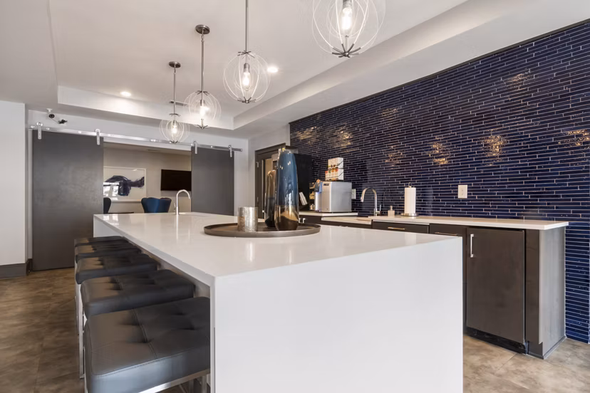 Clubhouse featuring modern design and vibrant interiors at Oberlin Court Apartments
