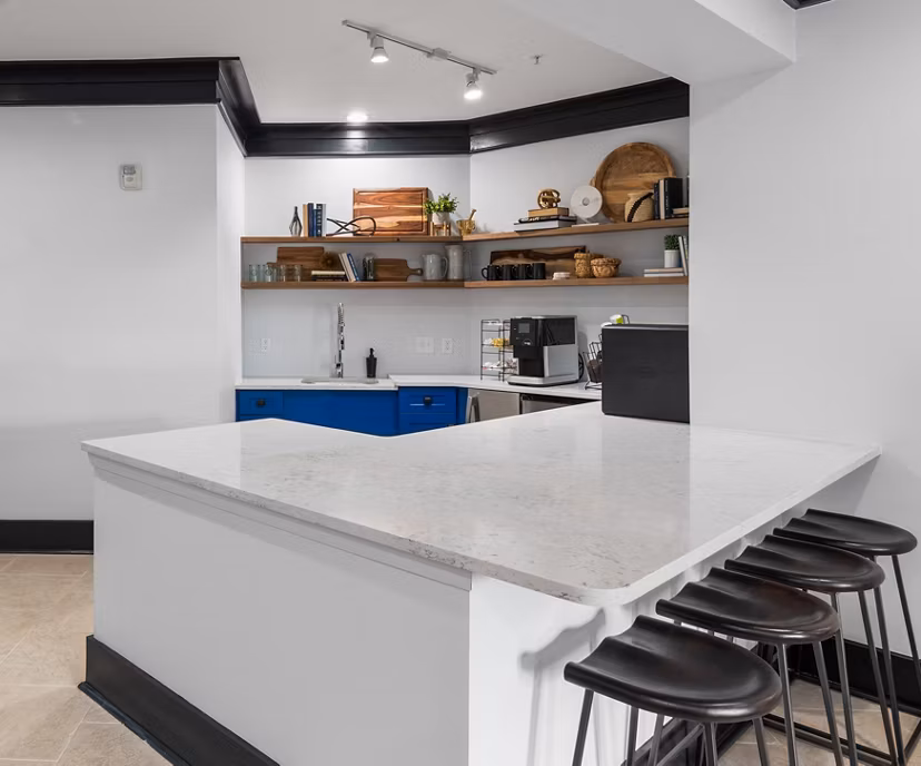 Stylish clubhouse with cozy seating and modern dÃ©cor at Oberlin Court Apartments
