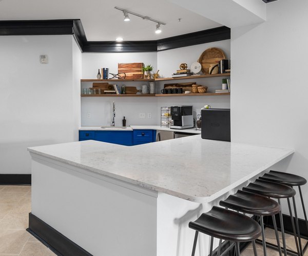 Stylish clubhouse with cozy seating and modern dÃ©cor at Oberlin Court Apartments