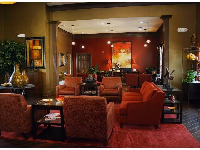 Clubhouse with modern decor and seating at Villas at Loganville luxury apartments