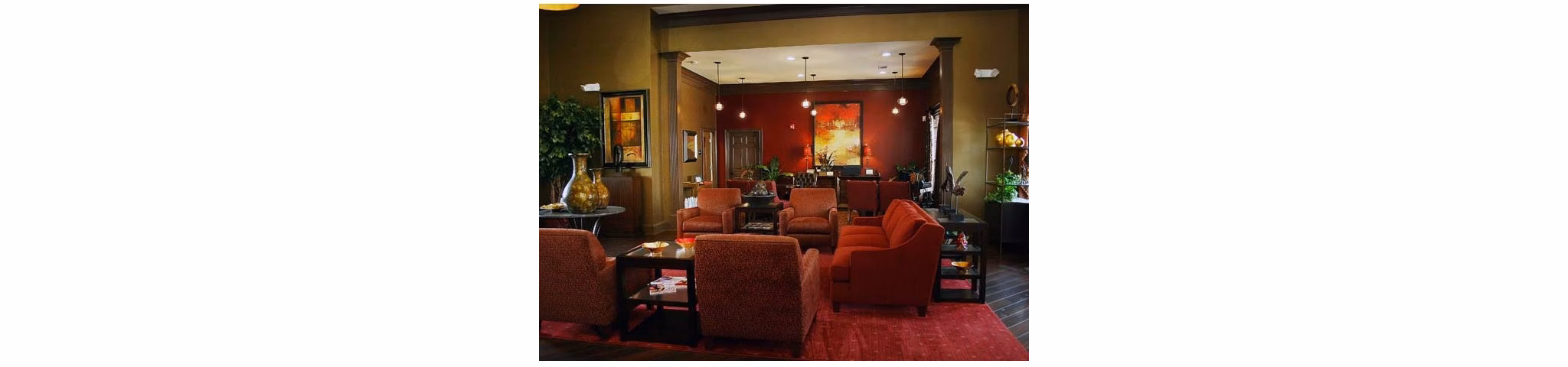 Clubhouse with modern decor and seating at Villas at Loganville luxury apartments