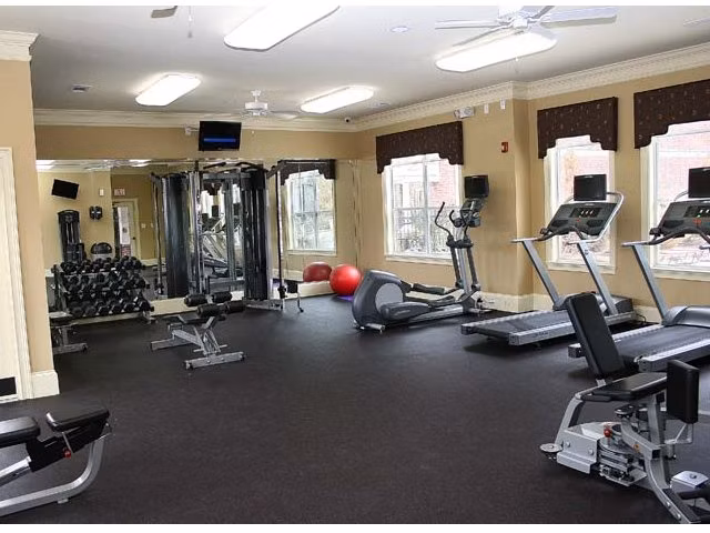 Fitness room with modern equipment at Villas at Loganville for luxury living