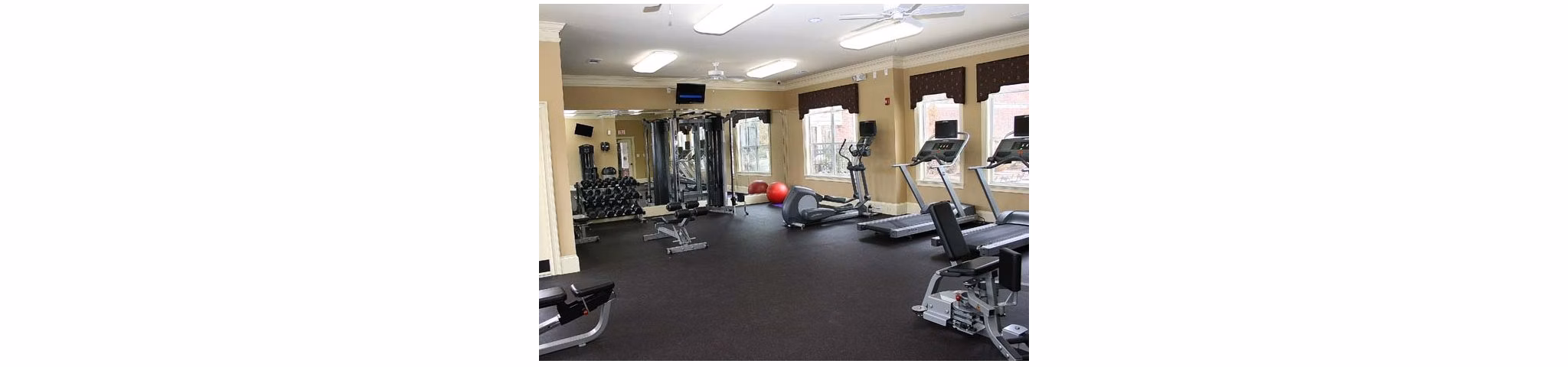Fitness room with modern equipment at Villas at Loganville for luxury living