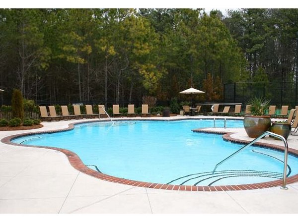 Luxurious outdoor pool at Villas at Loganville, perfect for relaxation and leisure activities in a serene environment