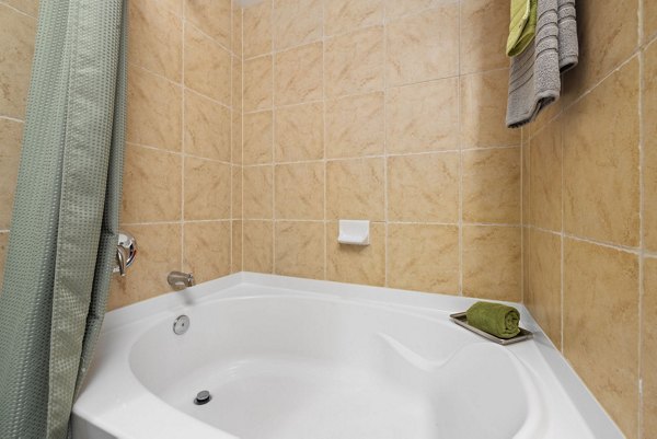 Elegant bathroom with modern fixtures at Artisan at Brightleaf Apartments