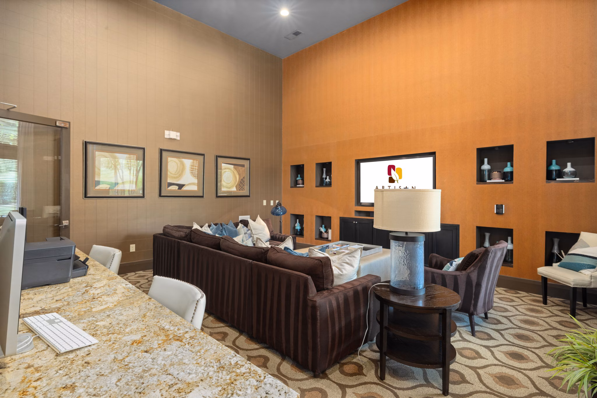 Lobby entrance featuring modern decor and seating areas at Artisan at Brightleaf Apartments