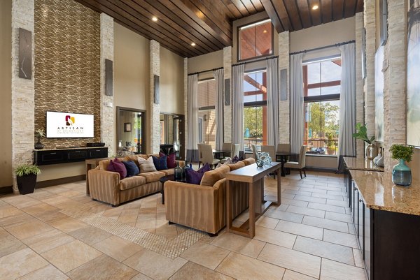 Lobby with modern seating and decor at Artisan at Brightleaf Apartments, offering luxury living experiences