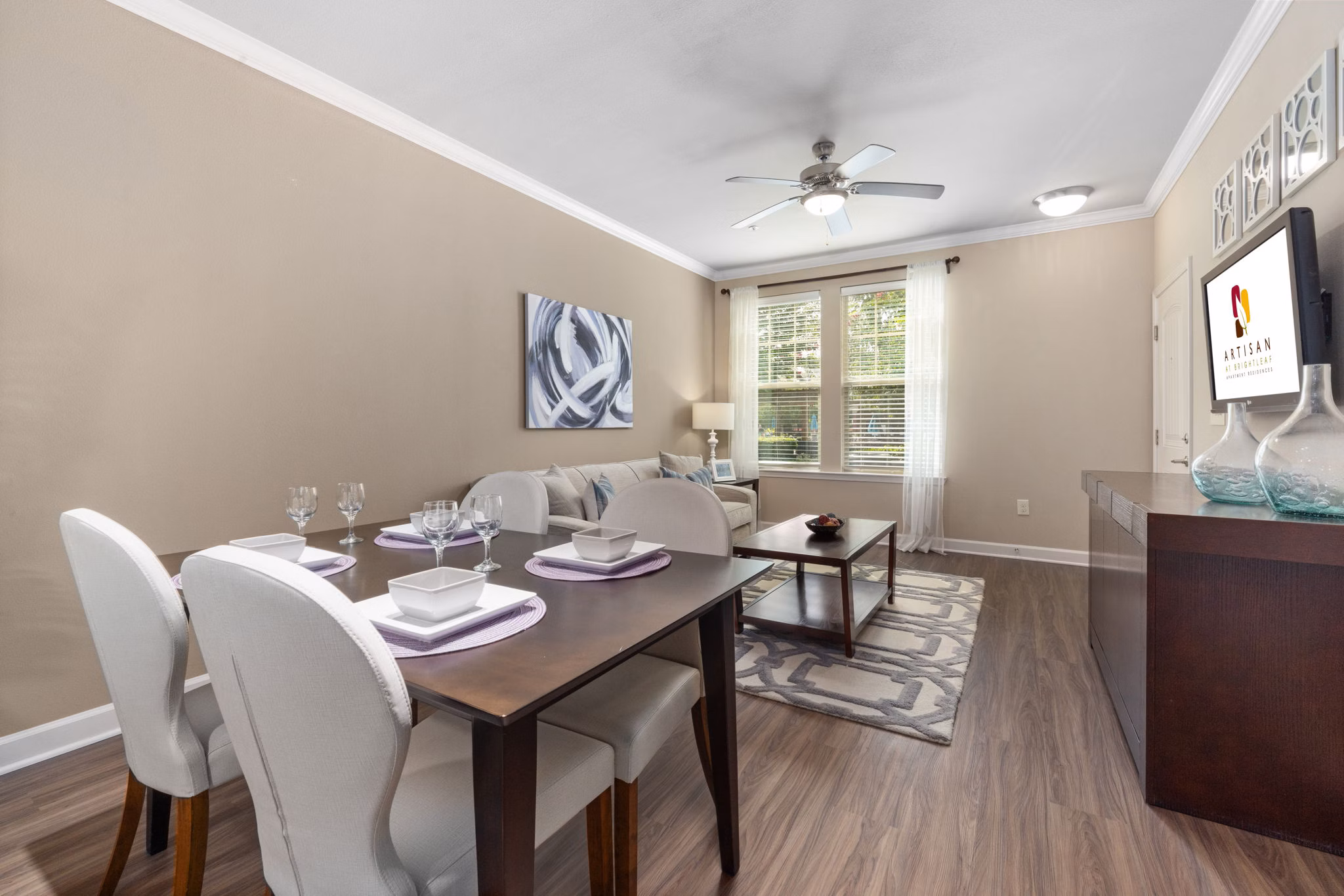 Elegant dining room with modern decor at Artisan at Brightleaf Apartments