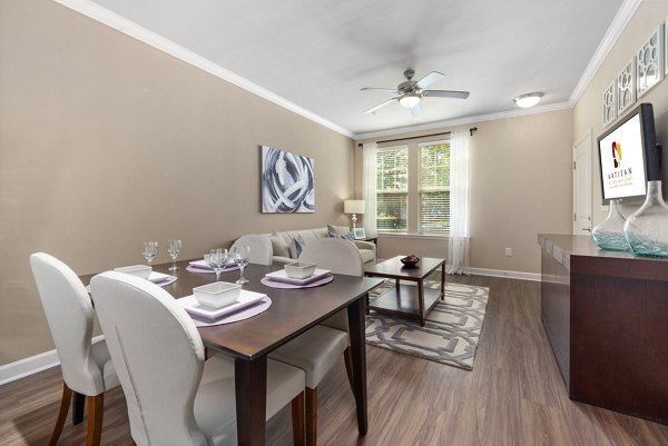 Elegant dining room with modern decor at Artisan at Brightleaf Apartments