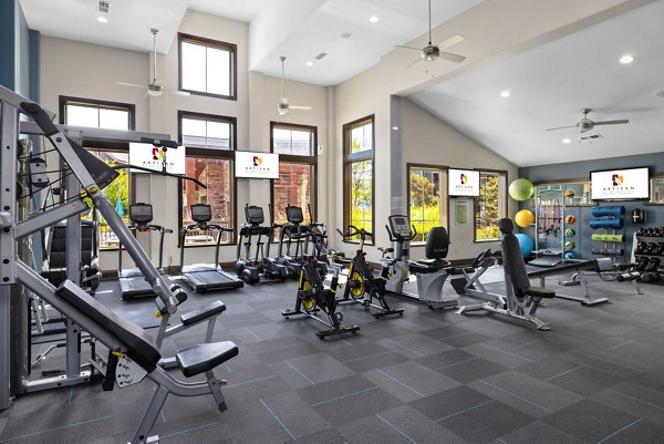 State-of-the-art fitness center featuring modern equipment at Artisan at Brightleaf Apartments