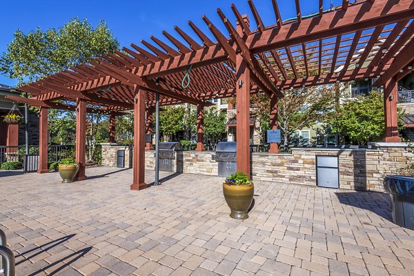 grill area/patio at Artisan at Brightleaf Apartments