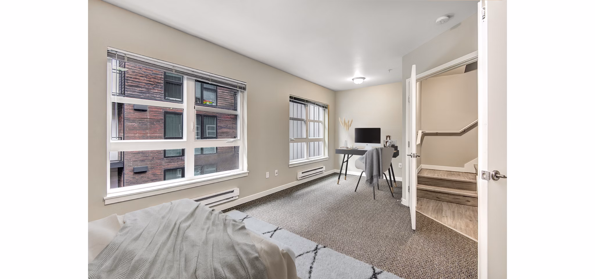 Spacious bedroom with modern design at 1611 on Lake Union Apartments, offering luxury living in a prime location