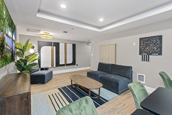 Modern clubhouse with lakeside views at 1611 on Lake Union Apartments, perfect for social gatherings and resident events
