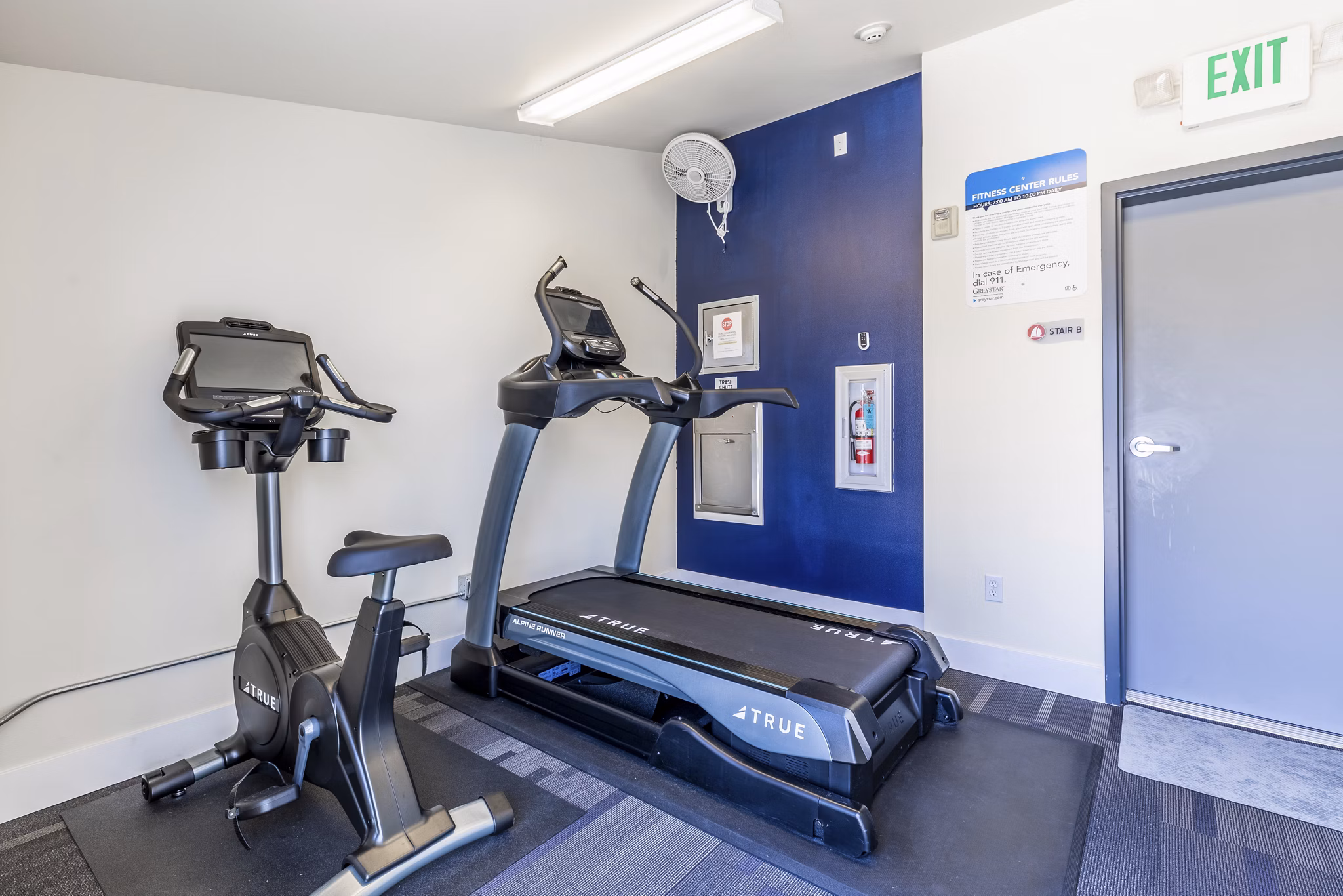 State-of-the-art fitness center at 1611 on Lake Union Apartments with cardio machines and strength equipment