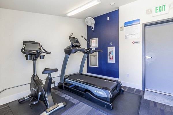 State-of-the-art fitness center at 1611 on Lake Union Apartments with cardio machines and strength equipment