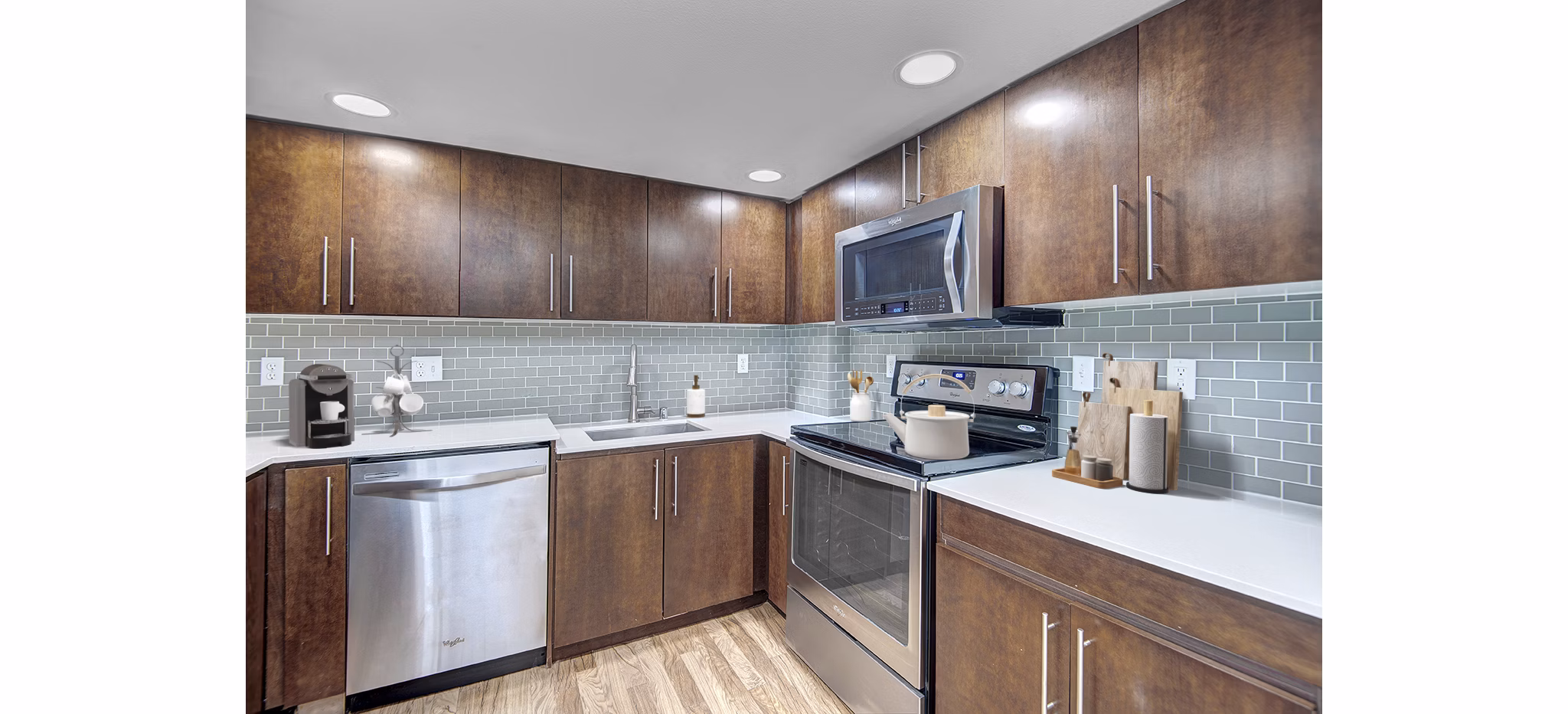 Modern kitchen with stainless steel appliances at 1611 on Lake Union Apartments