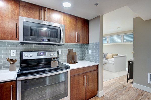 Modern kitchen with stainless steel appliances at 1611 on Lake Union Apartments